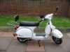 Click here to see more details on the Vespa PX200E Motoport